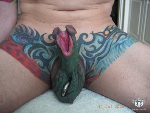 thought you've seen the ugliest tattoo ever? wait till you see this.
